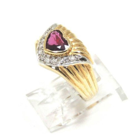 0.72CT RUBY AND DIAMOND RING SET IN SOLID 14K YELLOW GOLD